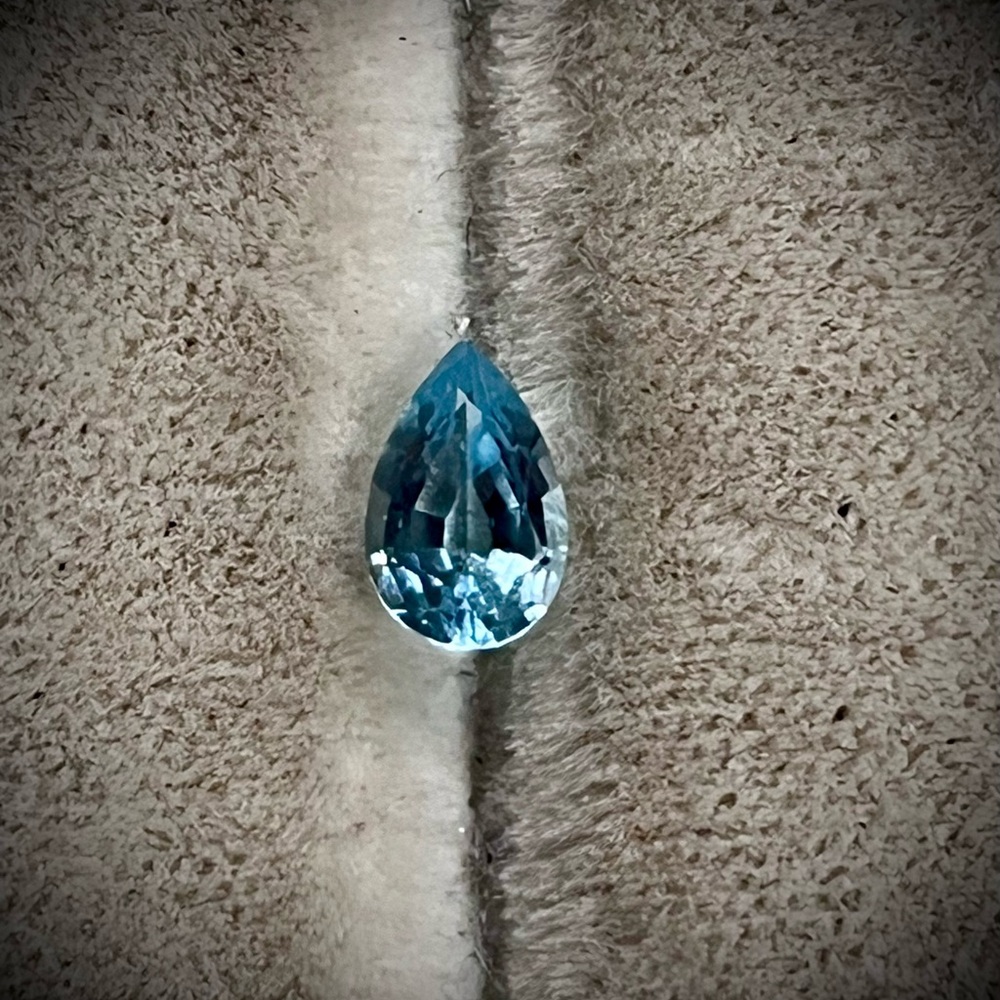 2.6 carat pear shaped blue topaz (December birthstone)